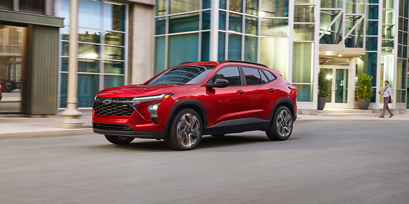2026 Red Chevrolet Trax cruising on road
