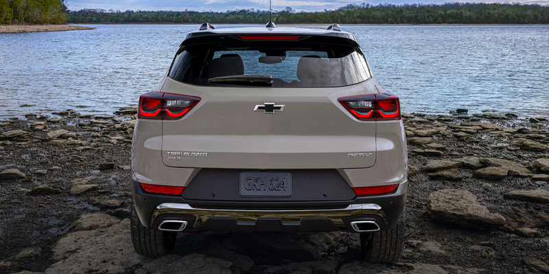 2026 Cream White Chevrolet Trailblazer parked river side in it's back profile